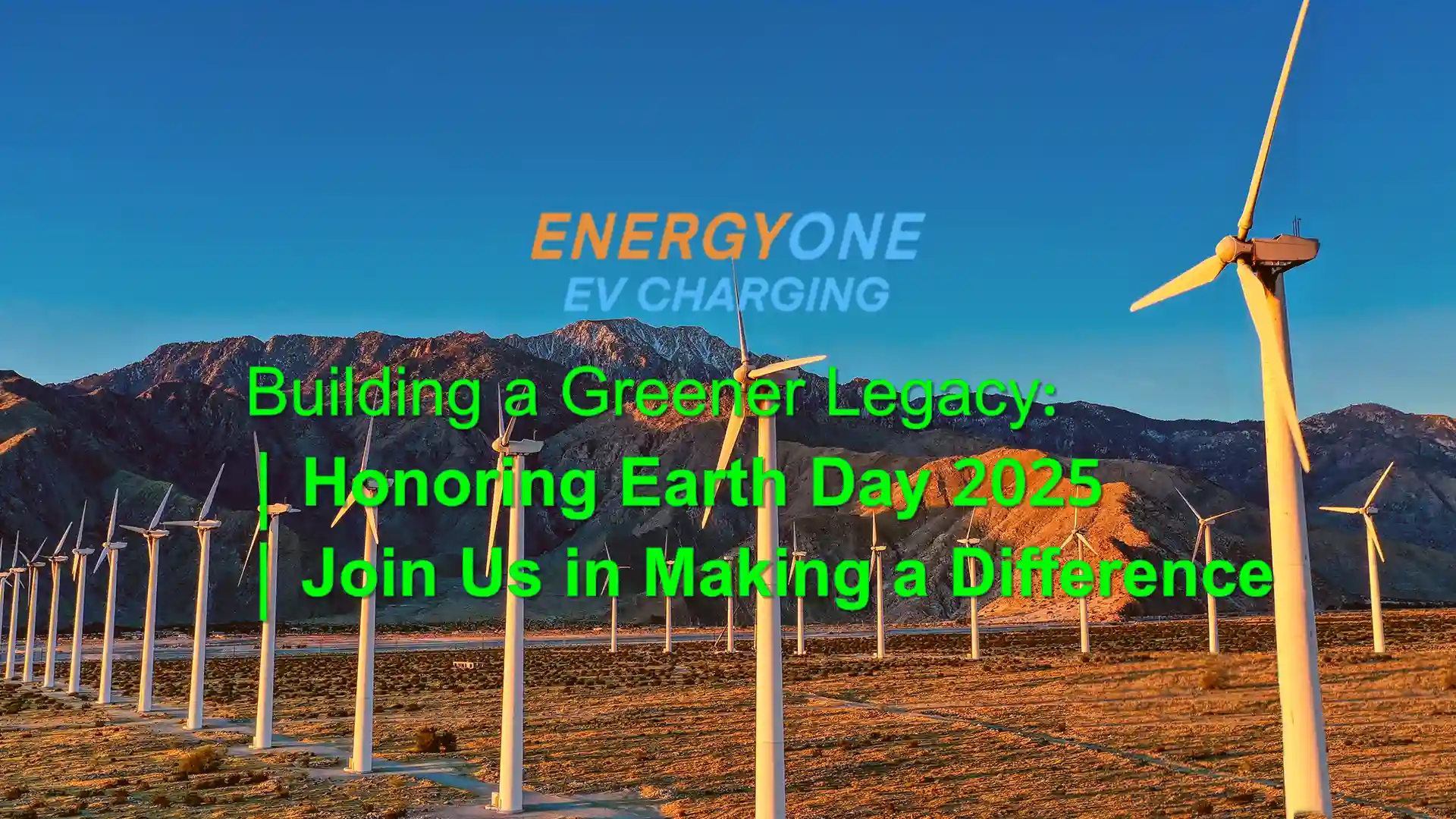 Earth Day 2025 Wind turbines in a desert landscape with mountains in the background; overlaid text promotes Earth Day 2025 and EV charging by Energy One.