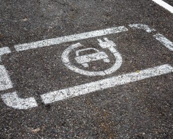 Parking space reserved for electric vehicle charging.