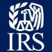 Logo of the Internal Revenue Service (IRS) with EV rebates and incentives, scales of justice, and laurel wreath.